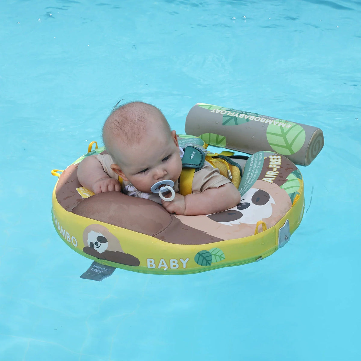 Baby floating on their back in the Sloth float — backstroke position for 3–12 months