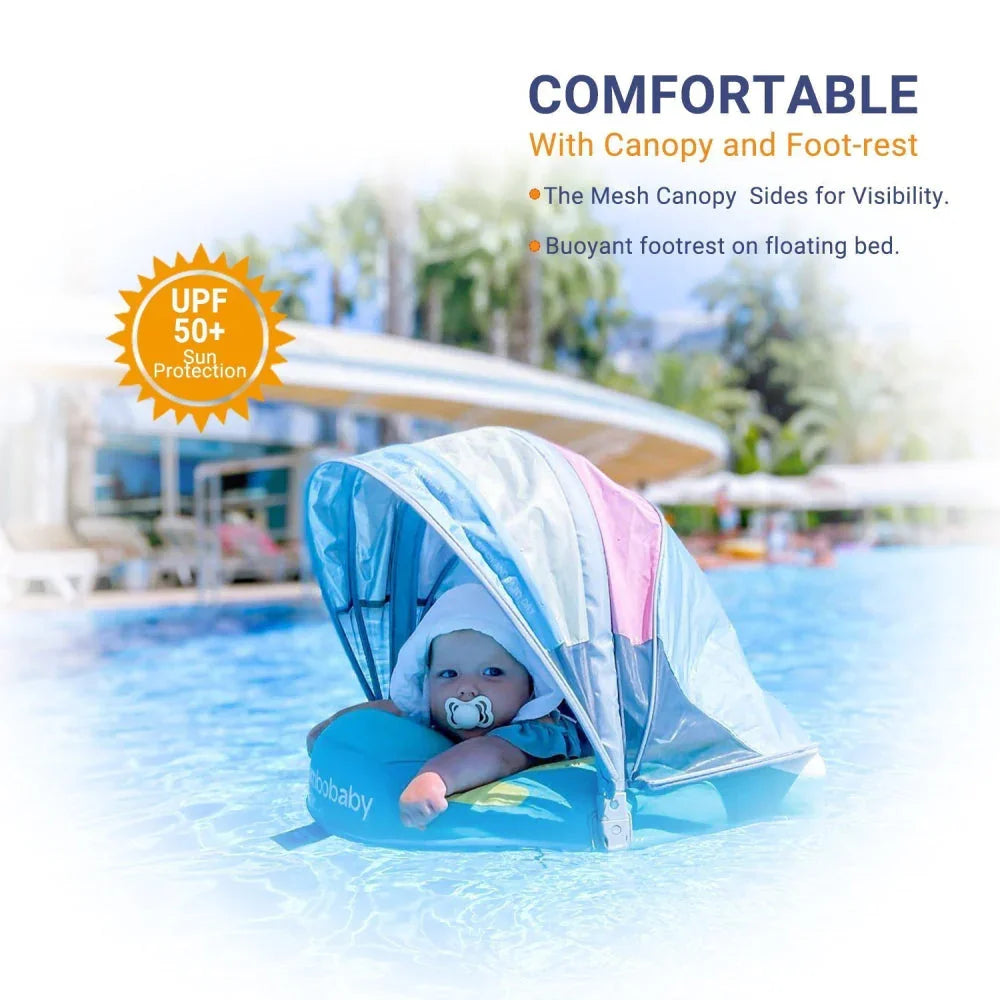 Baby in the Rainbow float in a pool under the UPF 50+ mesh canopy, foot rest in use